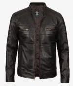 Dark brown leather jacket with a stand-up collar and zipper closure. Features two chest zip pockets and two side pockets, exuding a classic biker style.