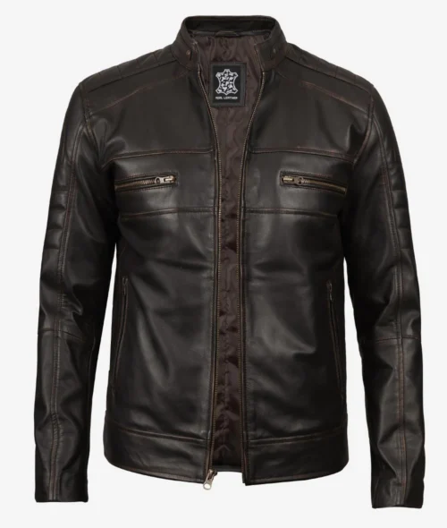 Dark brown leather jacket with a stand-up collar and zipper closure. Features two chest zip pockets and two side pockets, exuding a classic biker style.