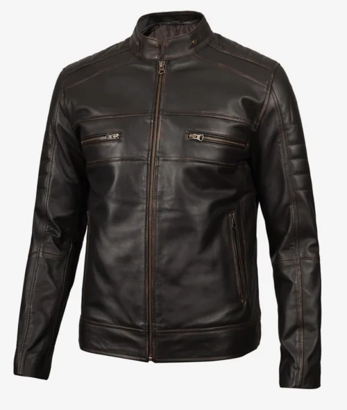 A sleek, dark brown leather jacket with a stand-up collar and front zipper. It features two horizontal zippered chest pockets, exuding a classic, edgy style.