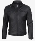 A black leather jacket with a standing collar and front zipper. It has shoulder detailing and two zippered chest pockets, conveying a sleek, modern style.