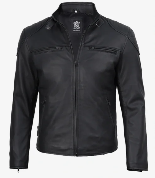 A black leather jacket with a standing collar and front zipper. It has shoulder detailing and two zippered chest pockets, conveying a sleek, modern style.