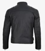 Black leather jacket viewed from the back, featuring padded shoulders and elbows, with a smooth texture and adjustable straps on the sides.