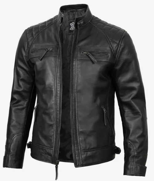 Black leather jacket with a sleek design, featuring quilted shoulder panels and multiple zippered pockets. The style is modern and edgy.