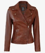 Brown leather jacket with a notched collar and silver zippers, featuring a stylish, fitted design. The label reads Real Leather.