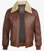 Brown leather jacket with a plush beige collar and ribbed cuffs. Features front pockets, creating a classic, rugged look. Warm and stylish.