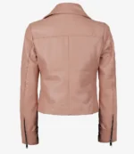 A back view of a light brown leather jacket with a collar, visible stitching, and zippered cuffs. The tone is sleek and stylish, perfect for a modern look.