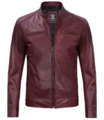Burgundy leather jacket with a sleek zip-up front, two chest pockets, and a stand collar. The smooth finish gives a stylish, modern look.