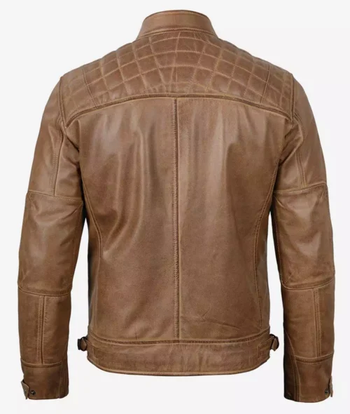 Brown leather jacket viewed from the back, featuring quilted shoulder panels and a straight collar. The design is sleek and rugged, evoking a classic style.