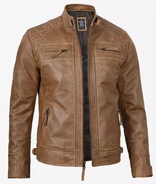 Brown leather jacket with a sleek design, featuring a front zipper, zippered pockets, and a high collar. The jacket conveys a stylish, rugged look.