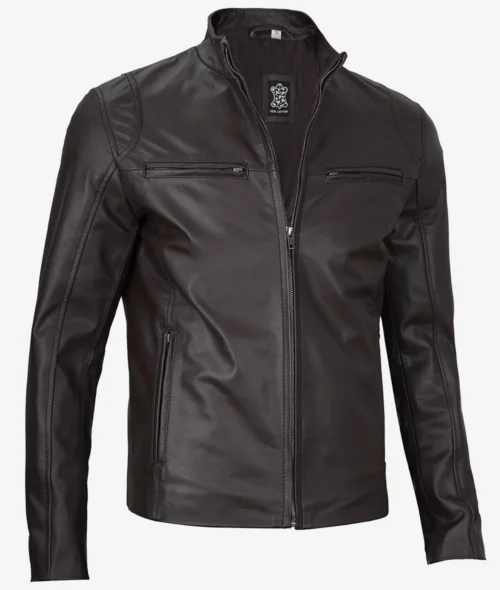 A sleek, dark brown leather jacket with a front zipper, high collar, and two zippered pockets on the chest. The jacket exudes a classic and stylish vibe.