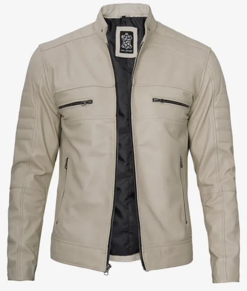 Beige leather jacket with a stand collar, front zipper open to show black lining. Features four zippered pockets, two on the chest and two at the waist.