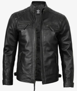 Black leather jacket with a sleek design, featuring quilted shoulders, diagonal chest zippers, and a stand-up collar, conveying a rugged, stylish tone.
