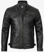 Sleek black leather jacket with a high collar, quilted shoulder panels, and zippered pockets. Exudes a stylish, modern, and edgy look.