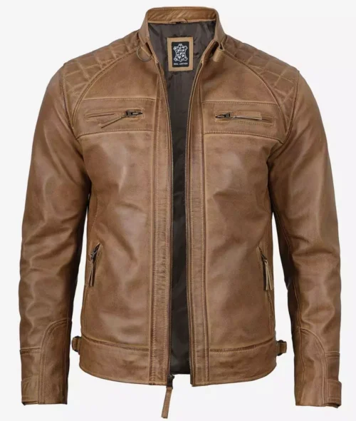 Brown leather jacket with a high collar, zipper closure, and multiple zippered pockets. The jacket has a rugged, vintage look.