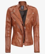 Brown leather jacket with a classic biker style, featuring silver zippers, shoulder epaulettes, and a smooth texture. The open lapels add a bold, edgy vibe.