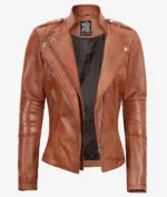 Brown leather biker jacket with a sleek design. Features a double-breasted front, asymmetrical zipper, and silver snap details for a bold, stylish look.