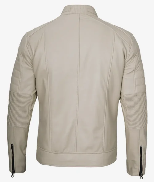 Back view of a beige leather jacket with ribbed panel details on sleeves and zipped cuffs. The sleek design suggests a modern and stylish tone.