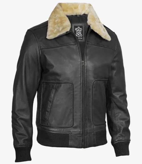 A black leather jacket with a cream-colored shearling collar. It features a front zipper, side pockets, and ribbed cuffs, giving a stylish, rugged look.