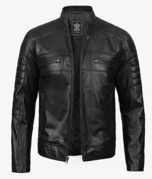 Black leather jacket with a stand-up collar, front zipper closure, and two zippered chest pockets. The sleek design conveys a modern, edgy style.