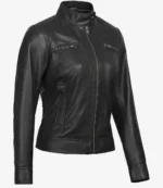 Black leather jacket with a sleek design, featuring a high collar with snap closure, zippered pockets on the chest, and front zipper. Stylish and modern.