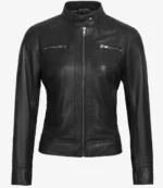 Black leather jacket with a high collar and front zipper. Features zippered chest pockets and long sleeves. Sleek, modern design exudes a stylish, edgy vibe.
