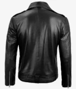 Back view of a black leather jacket with a classic collar, long sleeves, and zippers at the cuffs. The jacket has a sleek, smooth texture.
