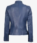 Blue leather jacket viewed from the back, featuring structured seams, a standing collar, and adjustable waist tabs with button details, conveying a sleek, modern look.