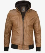 Brown leather jacket with a hood, front zipper, and multiple pockets. Features include epaulettes, ribbed cuffs, and a casual, rugged style.