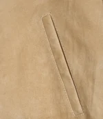 Close-up pocket detail on men’s camel suede leather jacket