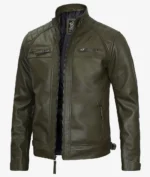 Olive green leather jacket with a high collar and zip closure. It features quilted shoulder panels, zippered chest and side pockets, and a sleek, modern design.