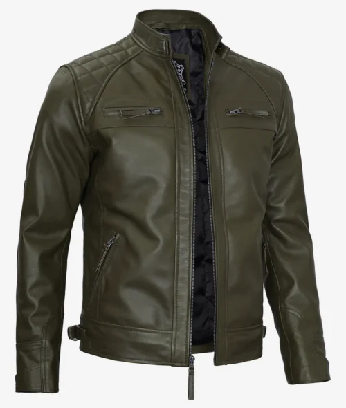 A stylish olive green leather jacket with quilted shoulders, a mandarin collar, and multiple zippers. The sleek design conveys a modern and edgy tone.