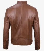 Brown leather jacket displayed from the back, featuring a smooth finish, a high collar, and zippered cuffs. The style is classic and timeless.