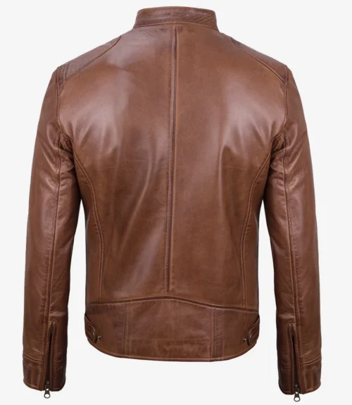 Brown leather jacket displayed from the back, featuring a smooth finish, a high collar, and zippered cuffs. The style is classic and timeless.