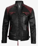 Black leather jacket with maroon quilted shoulders and accents, featuring zippers on the chest and sides. The design conveys a stylish, edgy tone.