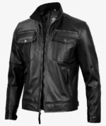 Black leather jacket with a high collar and multiple zip pockets on the chest and sides. The sleek design conveys a modern, edgy style.