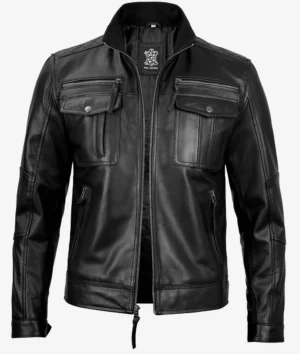 Black leather jacket with a front zipper, two zippered chest pockets with flaps, and side pockets. The style conveys a sleek, classic vibe.