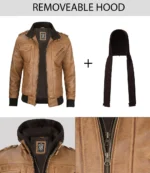 Tan leather jacket with black cuffs and zippers. Features a detachable hood shown separately. Close-up of collar and zipper detail at bottom.