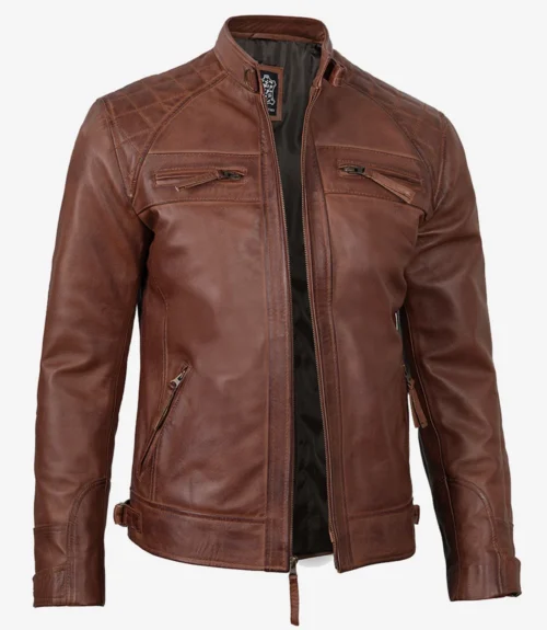 Brown leather jacket with a sleek design, featuring zippered chest and side pockets, a front zipper closure, and quilted shoulder detailing. Classic and stylish tone.