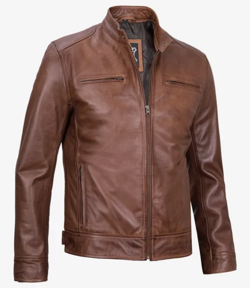 Brown leather jacket with a sleek, modern design. Features include a front zipper, two chest pockets, and a stand collar. Casual and stylish.