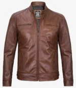 Brown leather jacket with a stand-up collar and front zipper. Features chest pockets and smooth texture, conveying a stylish, classic look.