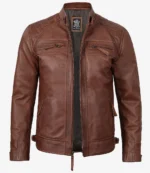 A classic brown leather biker jacket with a front zipper, two vertical chest pockets, and side pockets. The jacket has a sleek, rugged design.