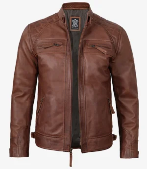 A classic brown leather biker jacket with a front zipper, two vertical chest pockets, and side pockets. The jacket has a sleek, rugged design.