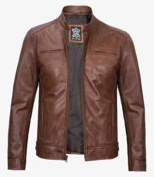 Brown leather jacket with a high collar and zip-up front, featuring two vertical chest pockets. The interior showcases a dark lining. Classic and sleek design.
