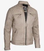 Beige leather jacket with a high collar and quilted shoulder design, featuring zippered chest and side pockets. The jacket conveys a stylish, rugged look.