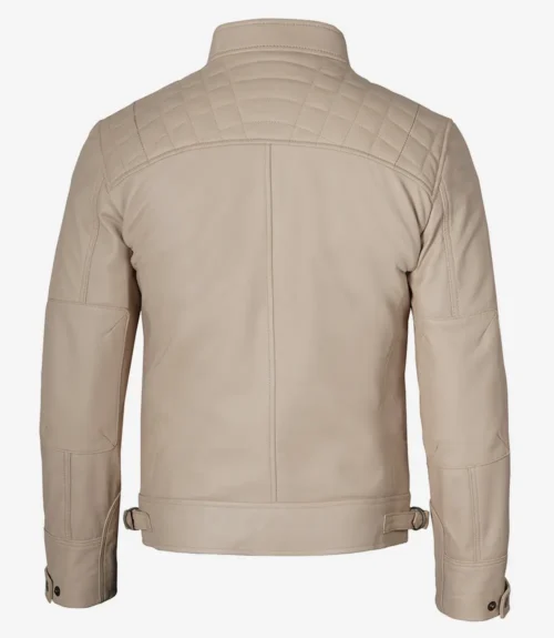 Beige leather jacket with a quilted pattern on the shoulders, showing the back view. The jacket features adjustable side straps and buttoned cuffs.