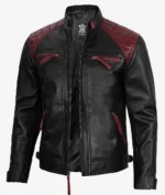 Black leather jacket with red quilted shoulder panels and red zipper accents on the pockets. It has a sleek, modern design, exuding a bold, stylish vibe.
