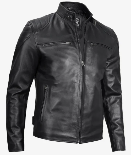 Black leather motorcycle jacket with a high collar, zippered front, and zippered pockets. The smooth texture and sleek design convey a cool, edgy vibe.
