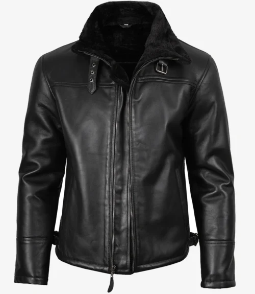Black leather jacket with a front zipper, faux fur lining, and high collar. Features buckle detail and side straps, conveying a sleek, stylish look.
