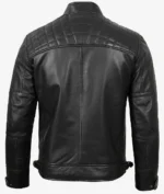 Black leather jacket with quilted shoulders and adjustable waist straps, viewed from the back. The sleek, sturdy design conveys a sense of edgy style.