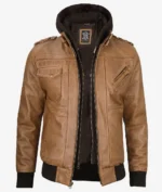 Brown leather jacket with a front zipper, two flap pockets, and ribbed black cuffs. It includes a detachable black hoodie for a casual, stylish look.